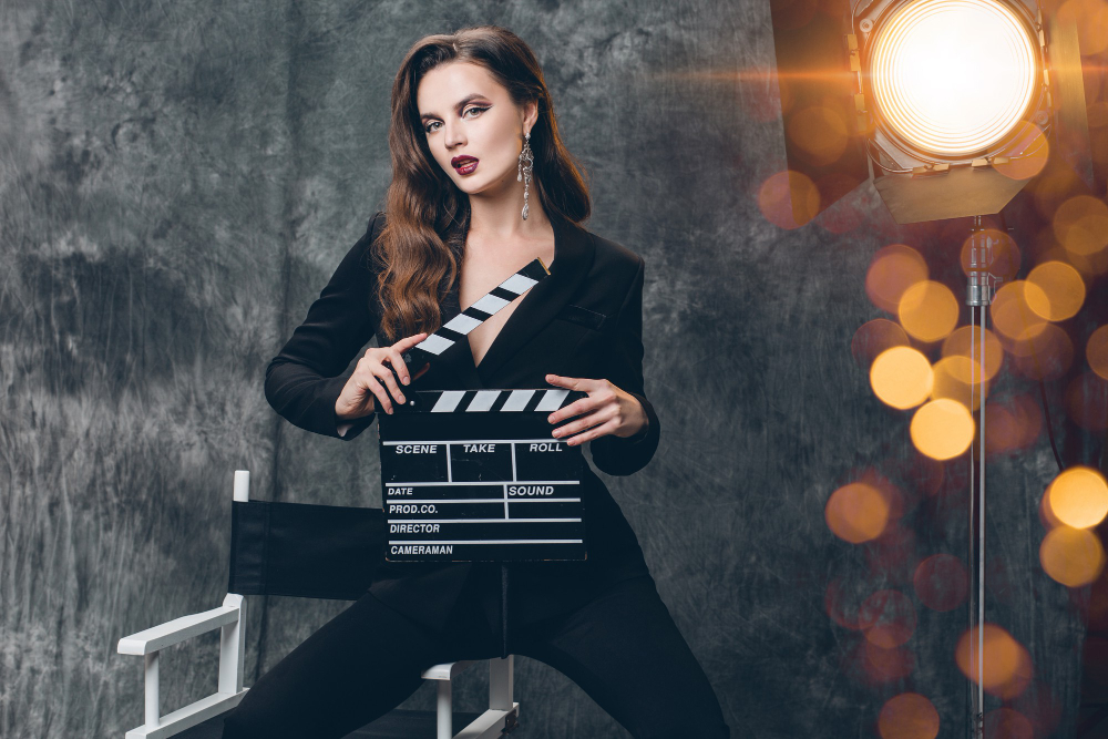 young-beautiful-stylish-sexy-woman-cinema-backstage-holding-movie-clapper